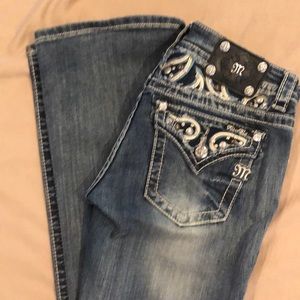 Miss Me jeans with button pocket.  In gently used condition.